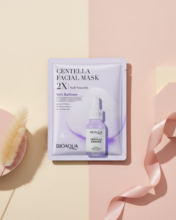 My Glam Room Bio Aqua Centella facial sheet mask in purple packaging on a pastel pink and beige background