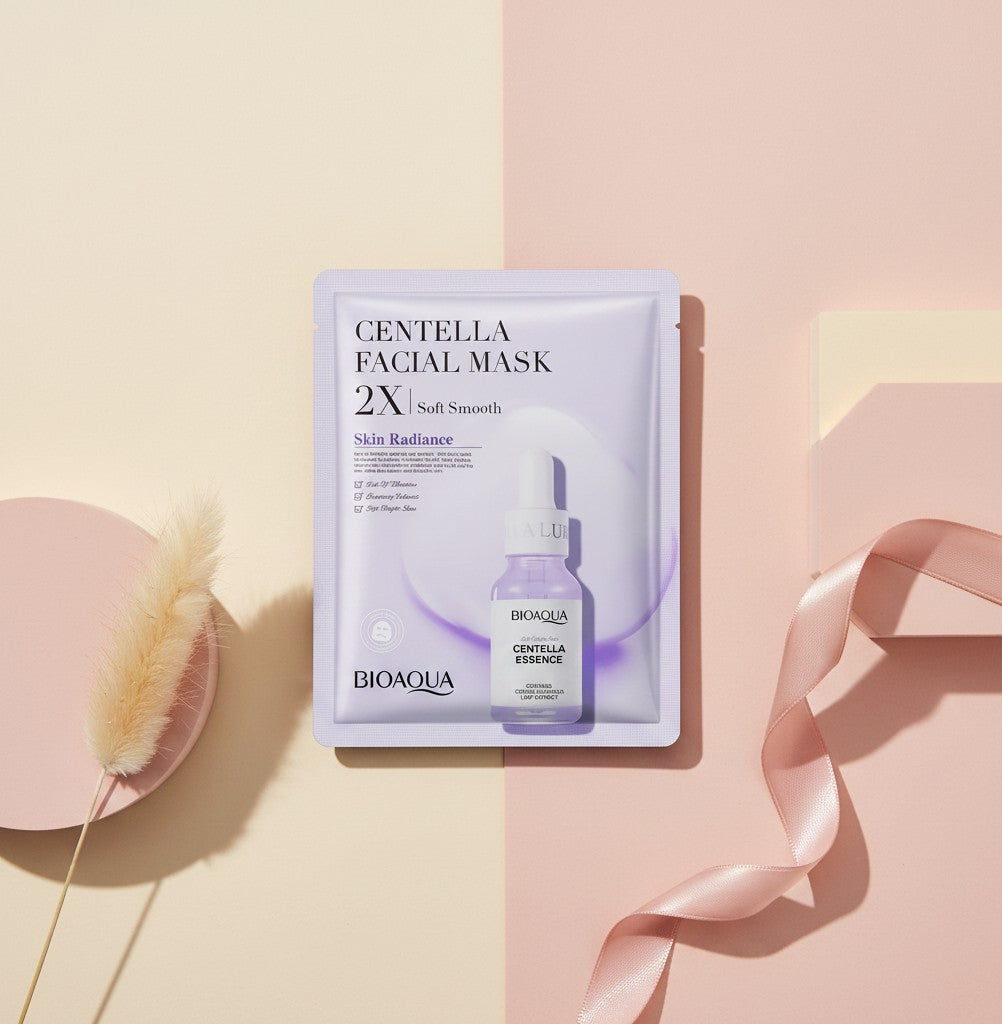 My Glam Room Bio Aqua Centella facial sheet mask in purple packaging on a pastel pink and beige background
