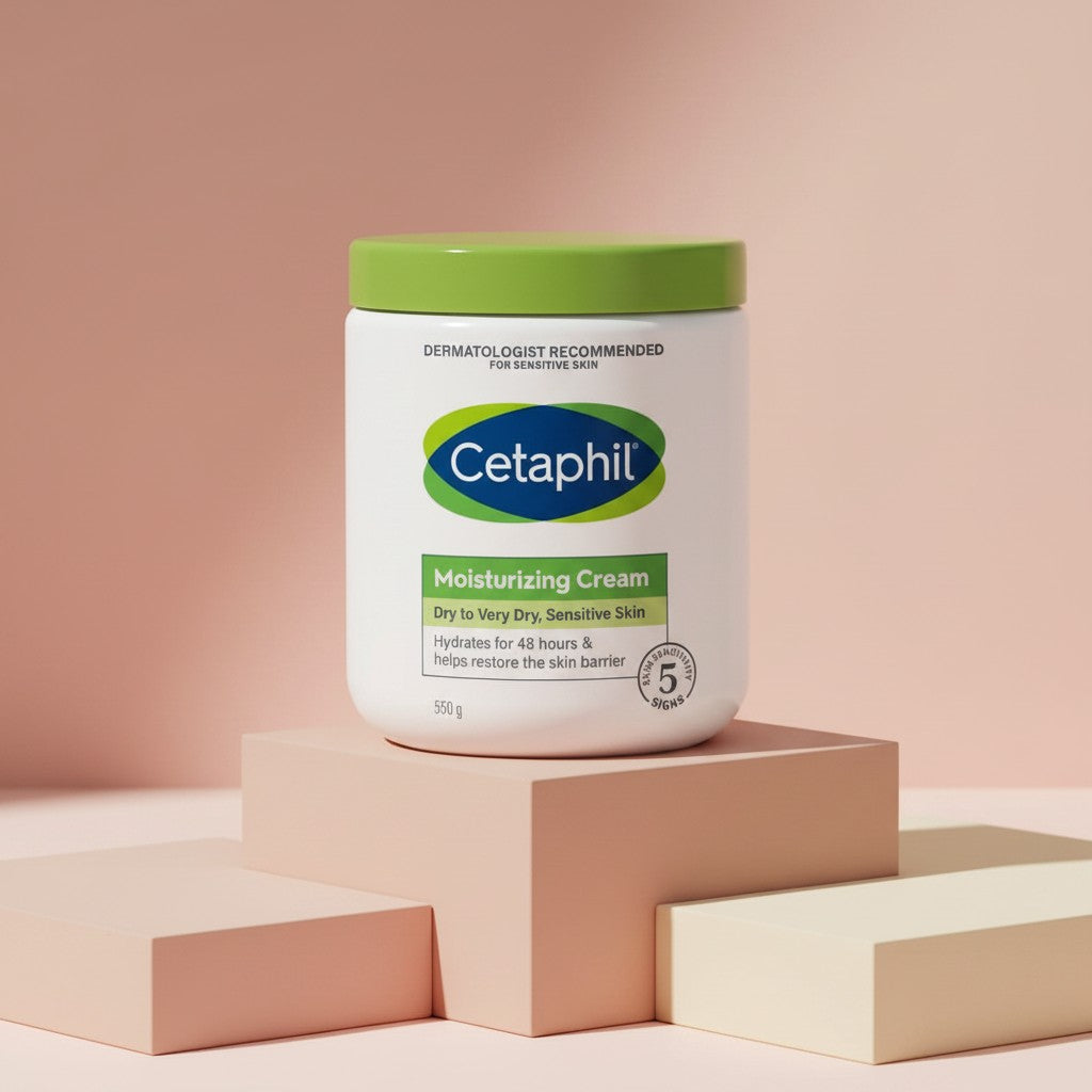 My Glam Room Cetaphil Moisturizing Cream for dry sensitive skin in a 550g white jar with a green lid on a pedestal.