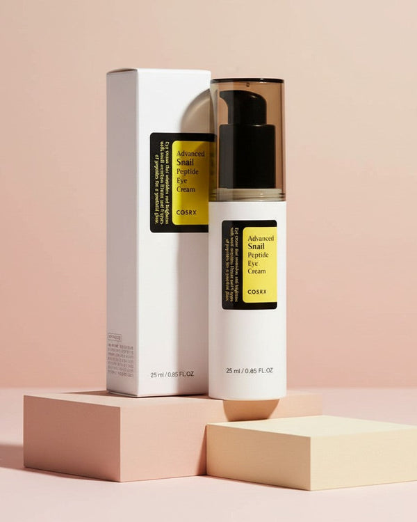 My Glam Room COSRX Advanced Snail Peptide Eye Cream in a white pump bottle with its matching product box.