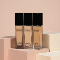 My Glam Room Dior Forever Skin Correct full-coverage concealers in three different shades on geometric pedestals.