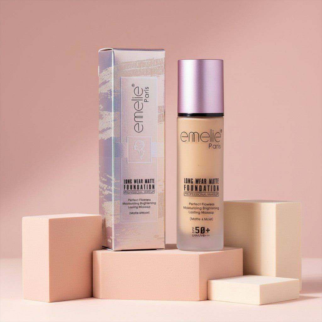 My Glam Room Emelie Long Wear Matte Foundation SPF50+ bottle and iridescent box on geometric pedestals