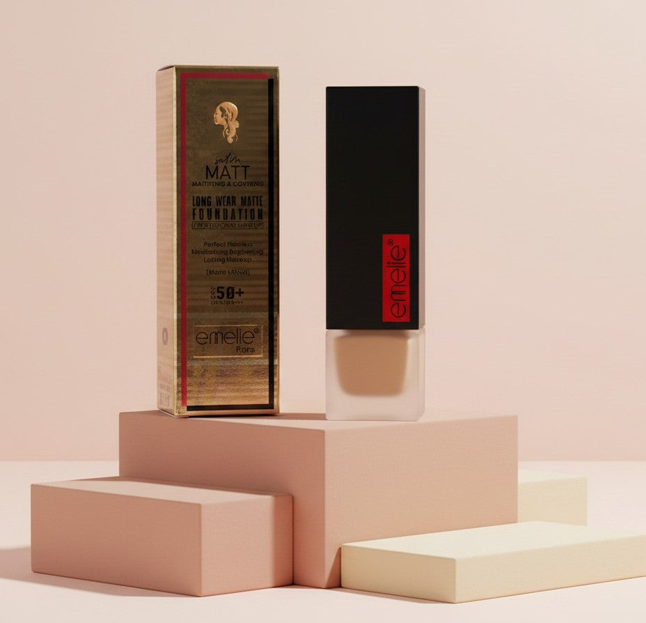 My Glam Room Emelie long wear matte foundation bottle and gold box on geometric pedestals