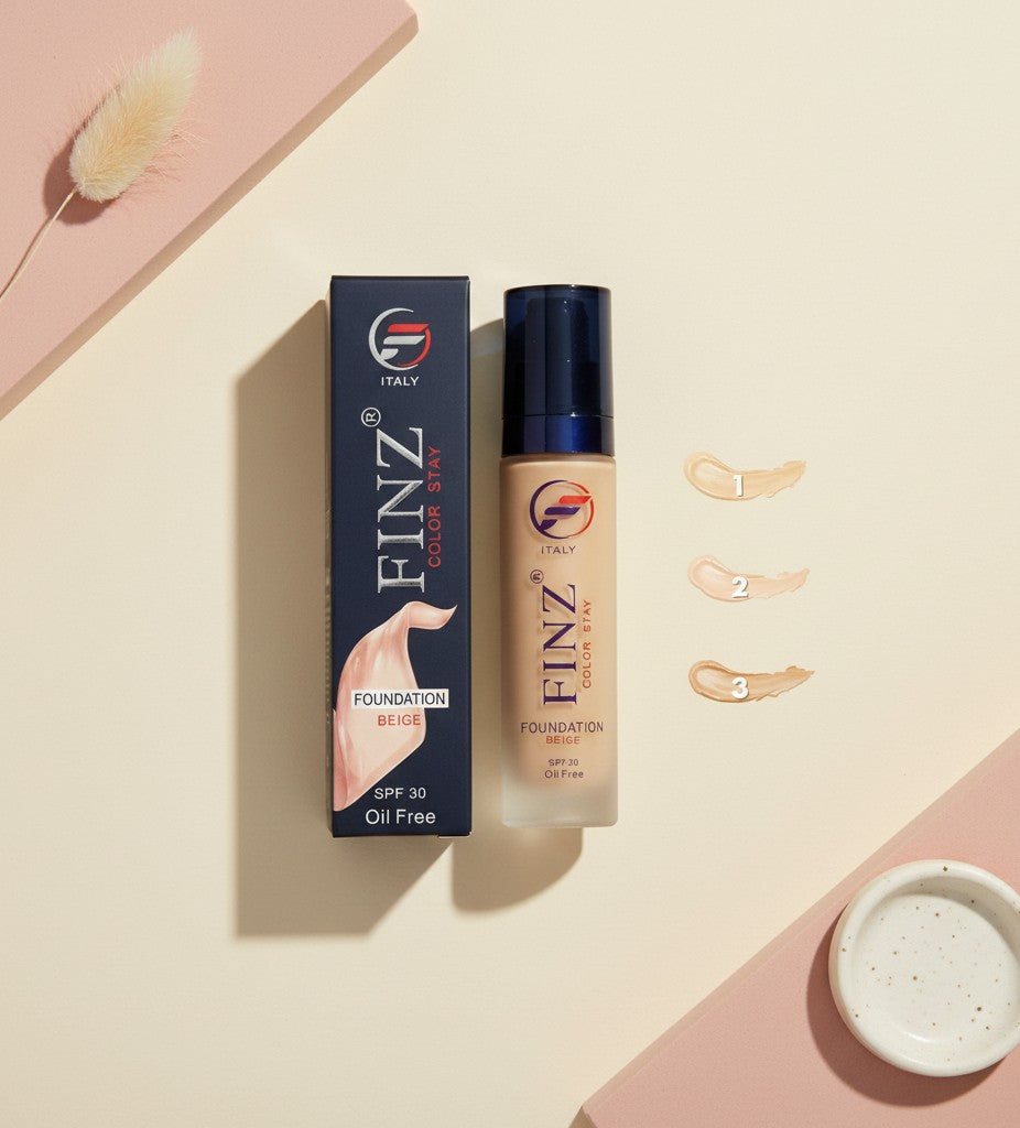 My Glam Room Finz Color Stay beige foundation bottle and box with SPF 30 and three shade swatches on a neutral background