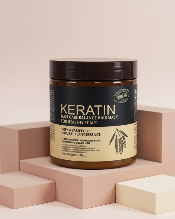 My Glam Room keratin hair treatment mask in a 500ml brown jar on a minimalist beige geometric display stand.