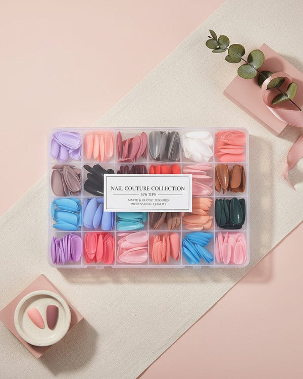 My Glam Room 576 piece set of assorted matte and glossy press-on nail tips in a clear plastic storage organizer box.