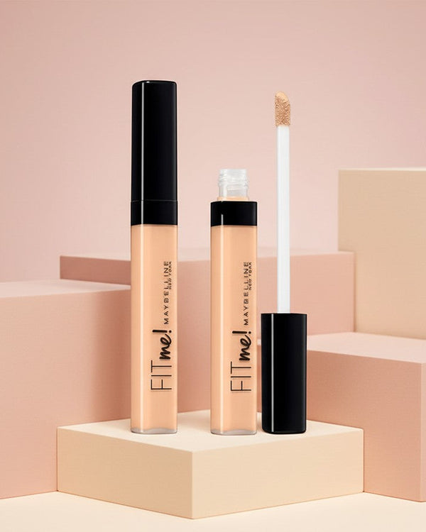 My Glam Room Maybelline Fit Me concealer tubes with applicator wand on geometric display blocks