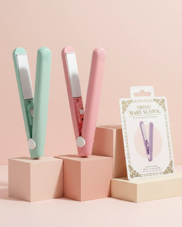 My Glam Room mini hair straighteners in pastel green and pink displayed on geometric blocks with product packaging
