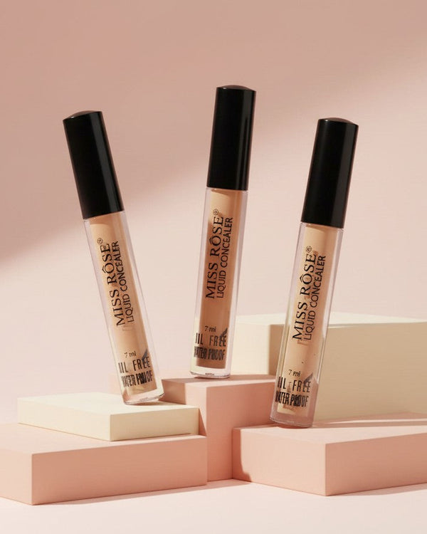My Glam Room MISS ROSE full coverage liquid concealer tubes in various shades displayed on geometric podiums.