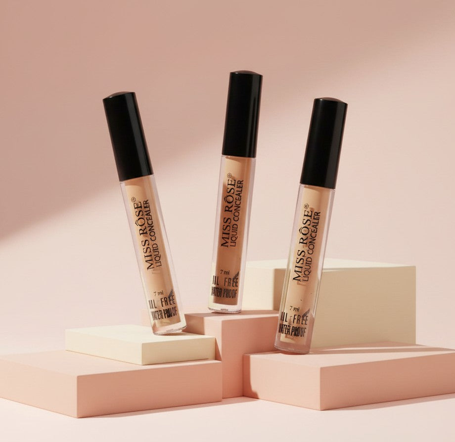 My Glam Room MISS ROSE full coverage liquid concealer tubes in various shades displayed on geometric podiums.