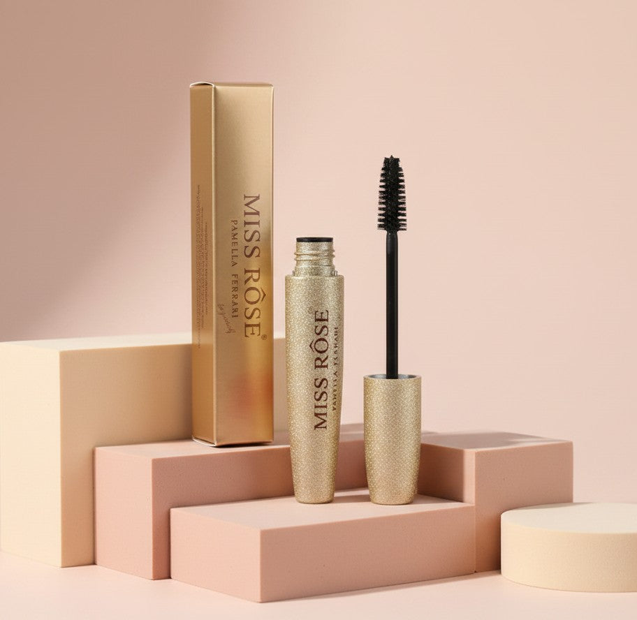 My Glam Room Miss Rose Pamella Ferrari mascara in a gold glitter tube with its matching box on a tiered display.