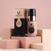 My Glam Room Miss Rose Purely Natural Foundation in a glass bottle with matching black and gold packaging box
