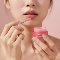 My Glam Room Laneige Berry Lip Sleeping Mask being applied to lips with a small applicator brush