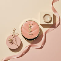 My Glam Room YSL Make Me Blush 24H buildable blurring powder blush in a pink compact with gold logo on beige background