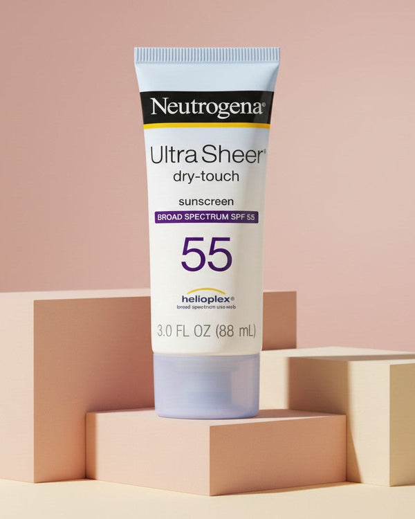 My Glam Room Neutrogena Ultra Sheer Dry-Touch SPF 55 sunscreen tube displayed on minimalist geometric pedestals.