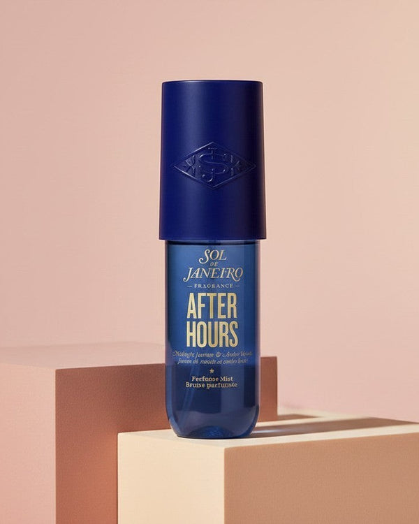 My Glam Room Sol De Janeiro After Hours Perfume Mist in a deep blue bottle displayed on minimalist geometric blocks.