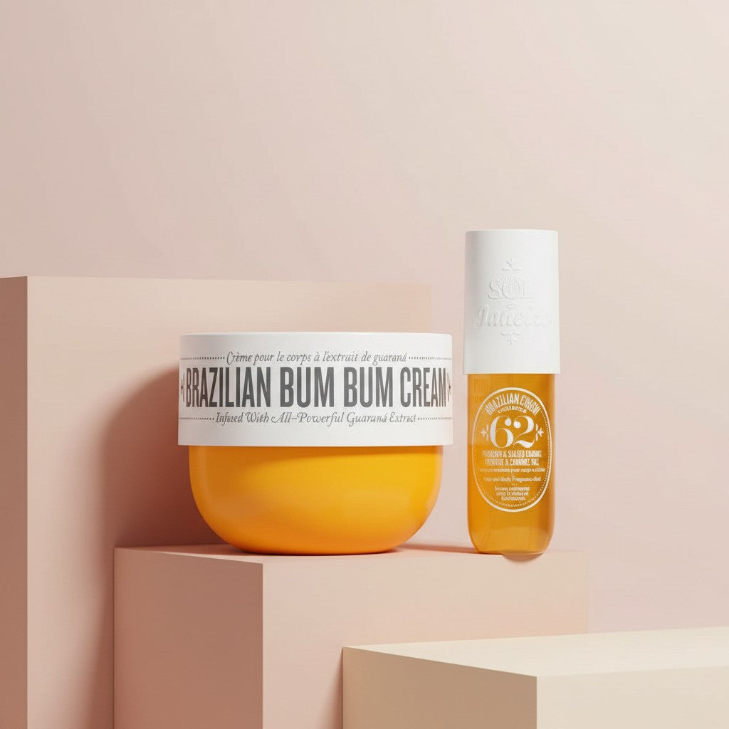 My Glam Room Sol De Janeiro Brazilian Bum Bum Cream and Cheirosa 62 perfume mist set on minimalist beige pedestals.