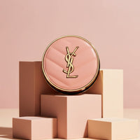 My Glam Room YSL Make Me Blush 24H buildable blurring powder blush in a round pink quilted compact with gold logo.