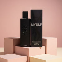 My Glam Room YSL MYSLF Le Parfum for men in a sleek black bottle with matching box on geometric pedestals
