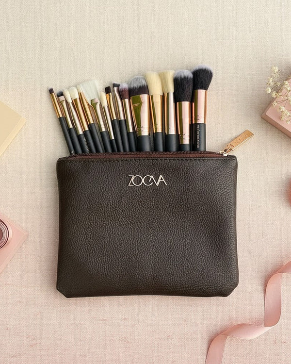 My Glam Room Zoeva 15-piece makeup brush set with rose gold accents in a dark brown textured leather travel pouch.